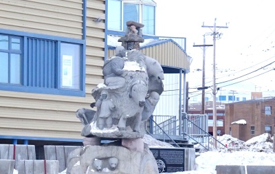 From every angle there's something new on this huge carving about the Igluvut building in Iqaluit. (PHOTO BY JANE GEORGE)